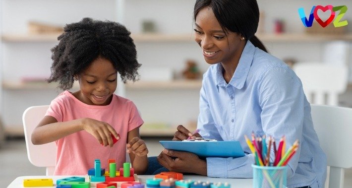 autistic child with a nurse observing her behavior