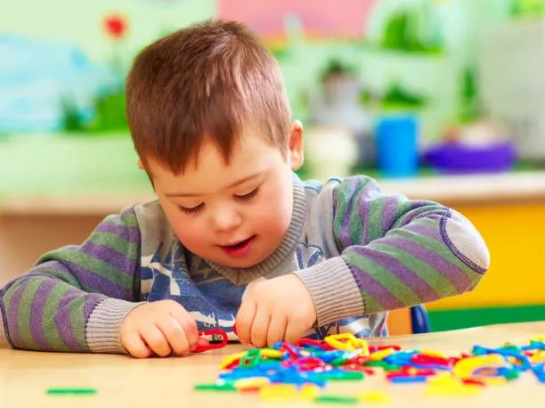 Autistic child playing/therapy